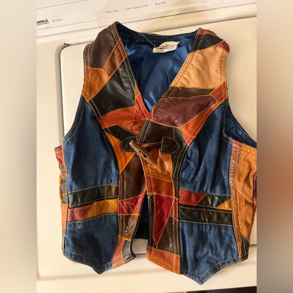 Vintage child’s leather and denim vest